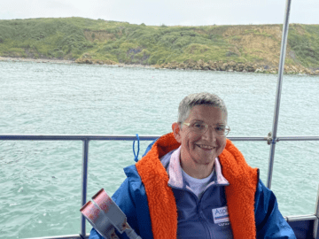 Eleanor Reddington smiling on boat