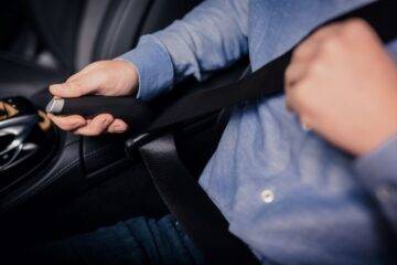 Seat buckle extender